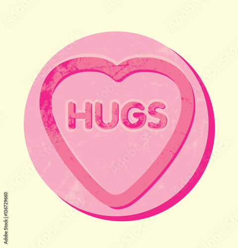the word hugs in a giant heart shaped sweet or cookie
