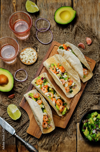 Shrimp tacos with avocado salsa