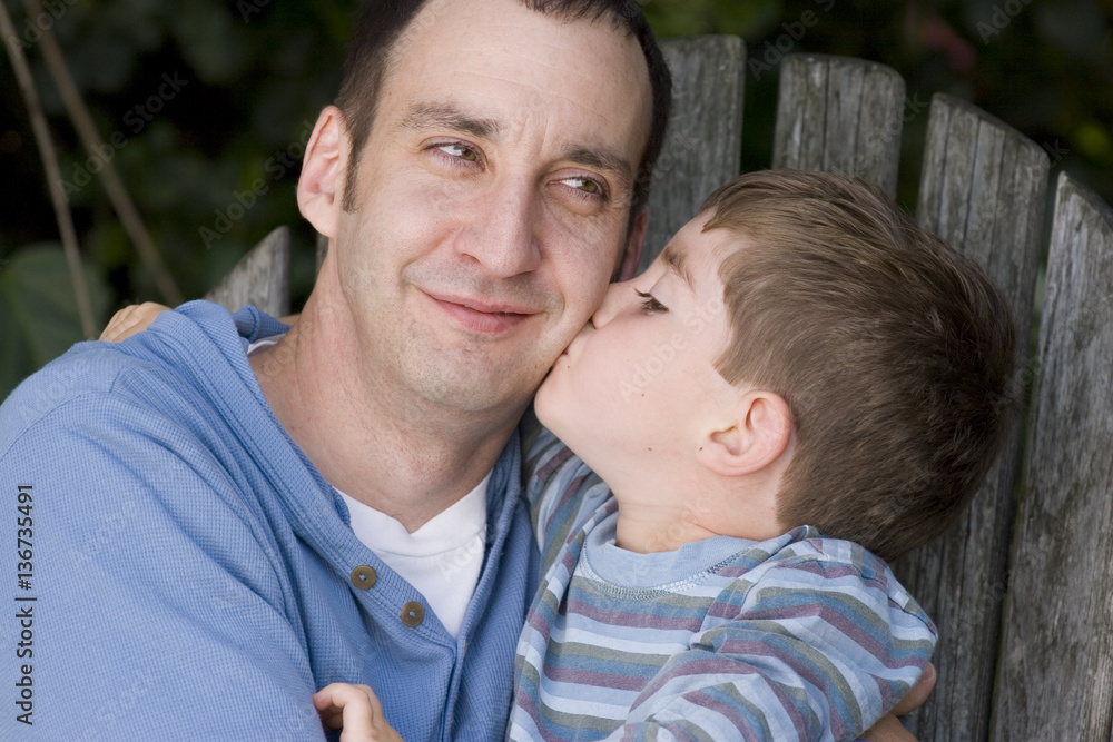 Portrait of a happy father and his son. Portrait of a happy father and his son.