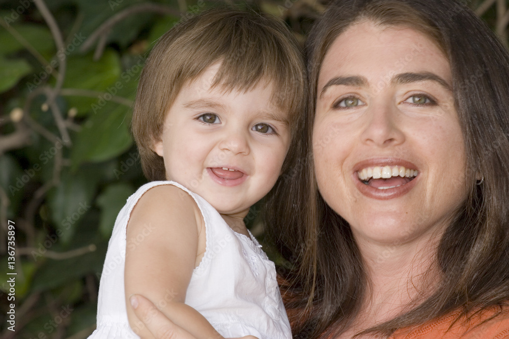 Portrait of a happy mother and her daughter. Portrait of a happy mother and her daughter.