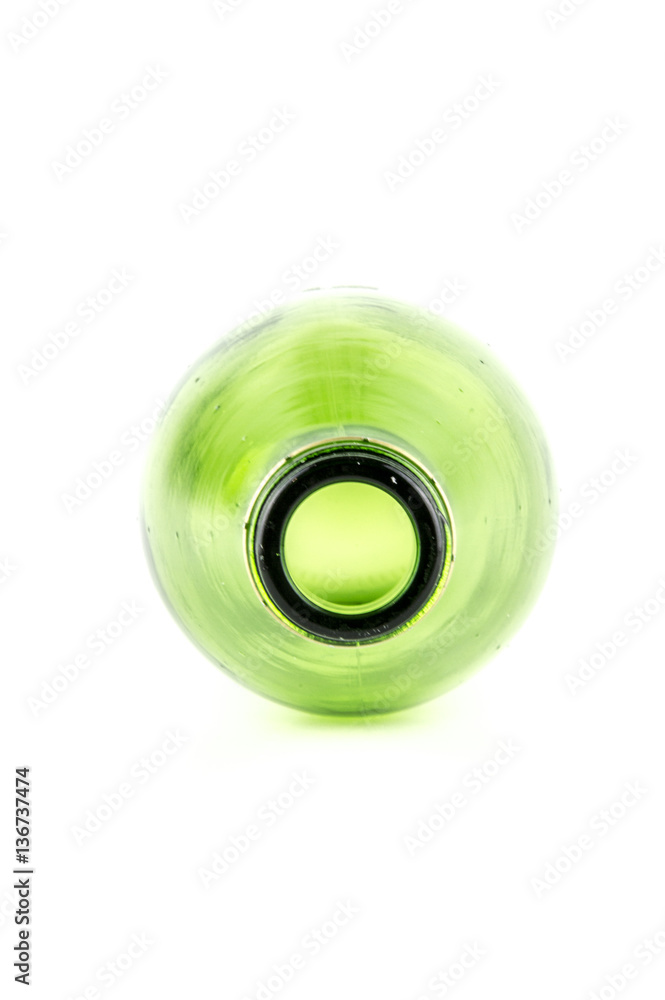 Glass green bottle. View inside. Isolated on white background