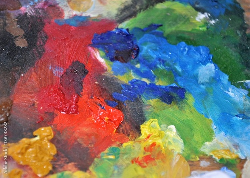 Fototapeta Naklejka Na Ścianę i Meble -  Colorful closeup painter's palette abstract creative texture background