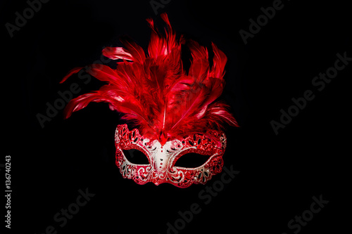 Carnival Halloween mask isolated on black background.