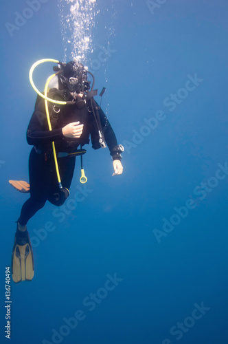 Scuba diver in open water © Microgen