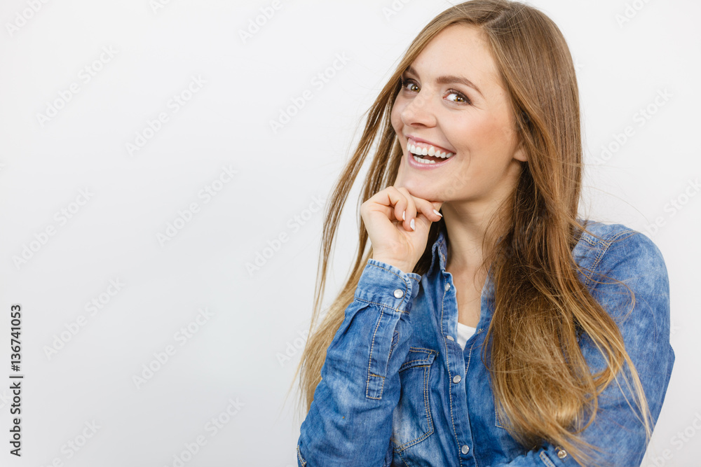 Fototapeta premium Cheerful young lady is smiling.