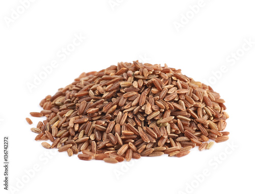 Pile of brown rice grains isolated