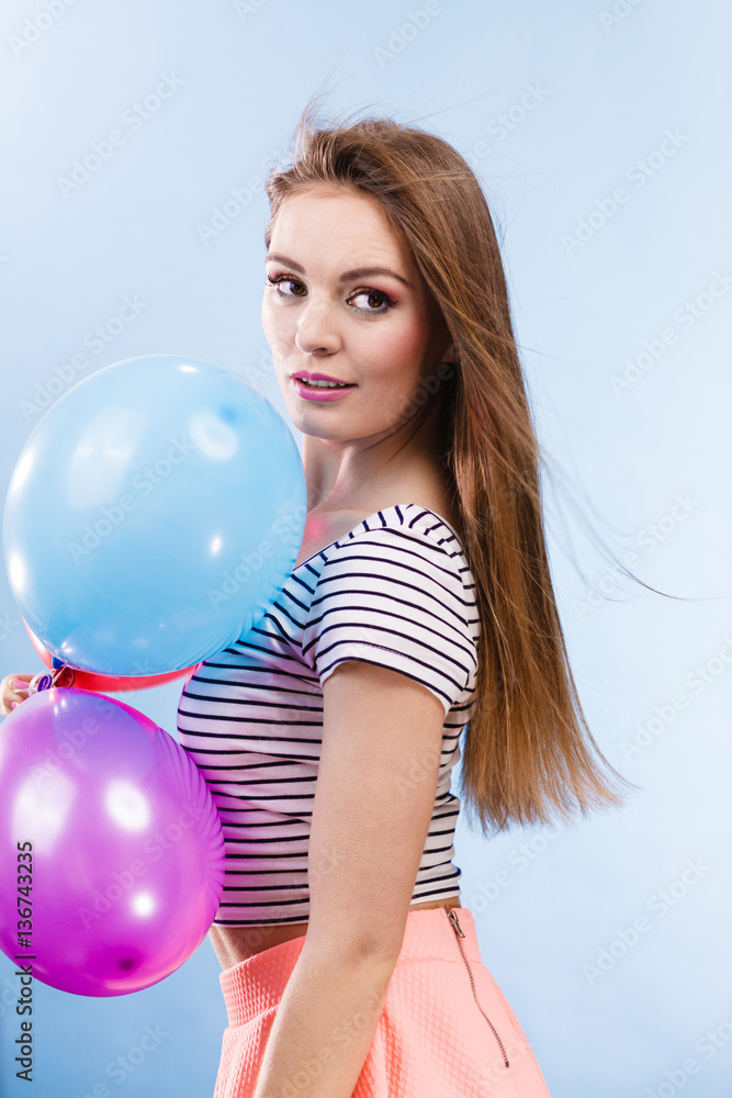 Woman summer joyful girl with colorful balloons Woman summer joyful girl with colorful balloons