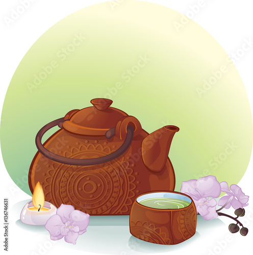 tea ceremony with a ceramic teapot and orchid flowers
