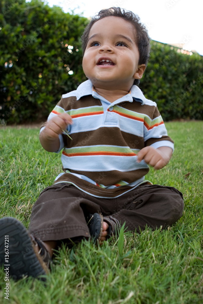 Head and shoulders portrait of a Hispanic boy.