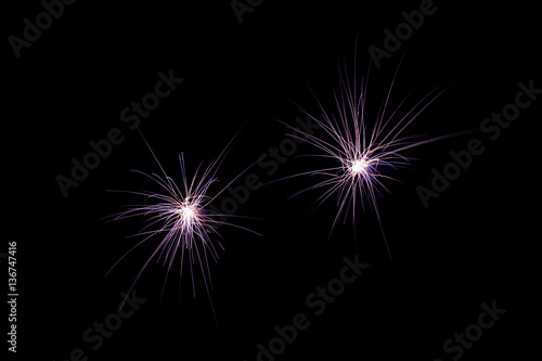 Two fireworks on black background at international competition i