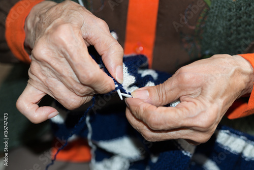 Detail of a person knitting