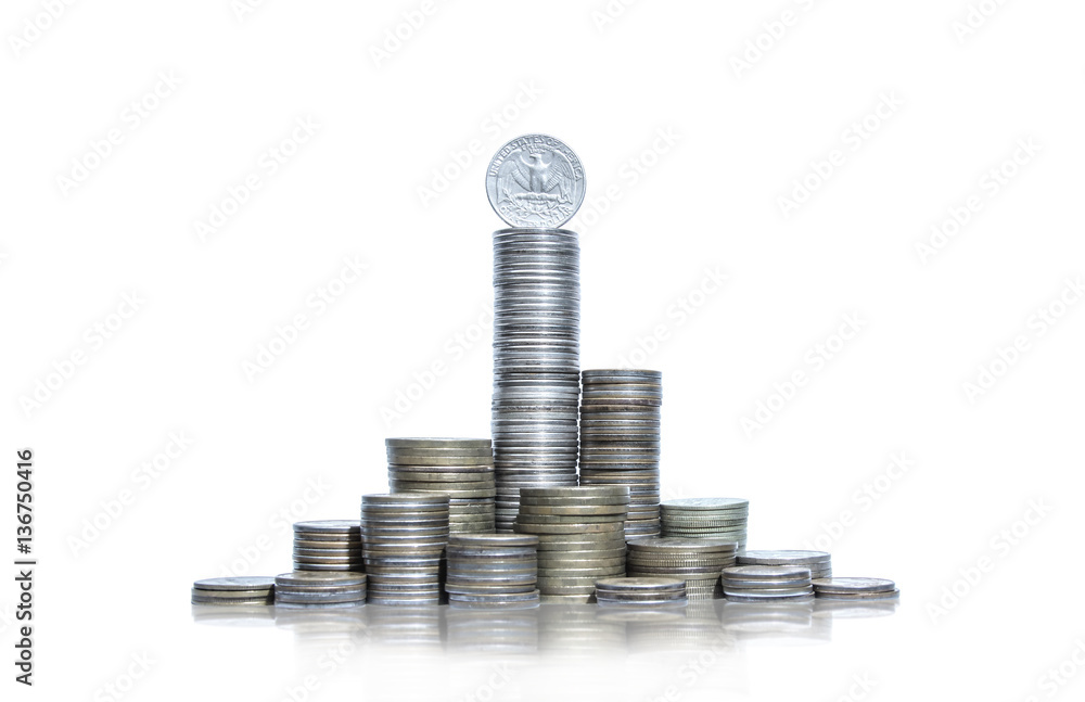 Large group of piles of coins with quarter dollar on top Large group of piles of coins with quarter dollar on top