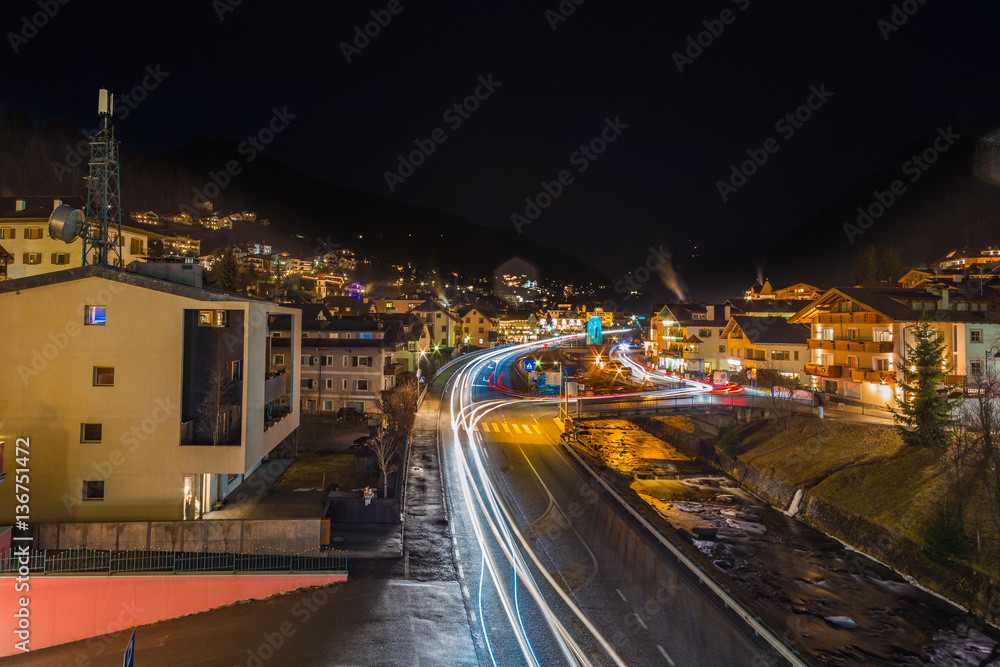 night view of modern bridge to mountain village
