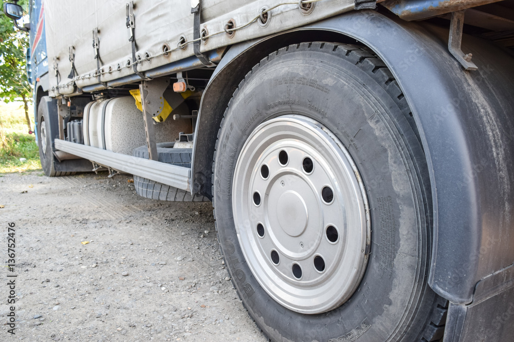The wheels of the truck near. A large truck The wheels of the truck near. A large truck