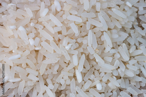 Raw white rices background.