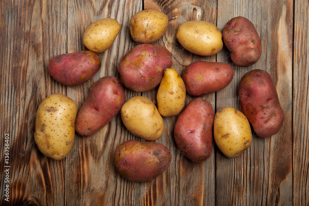 Potatoes on a rustic background Potatoes on a rustic background