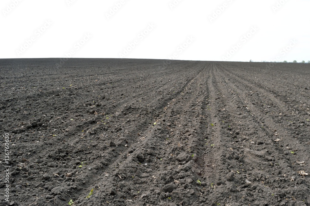 Plowed field of the black earth in spring Plowed field of the black earth in spring