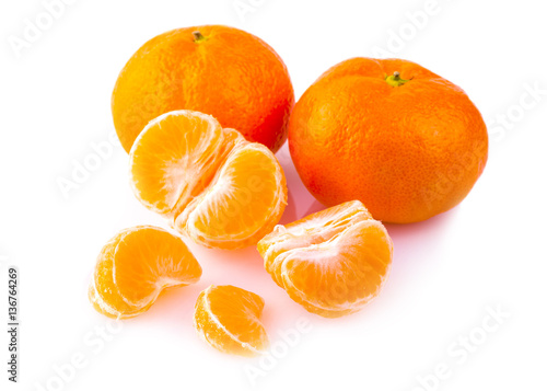 Ripe mandarines close-up on a white background