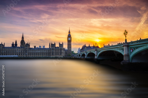 Westminster's sunset with Big Ben, Parliament and river Thames. 