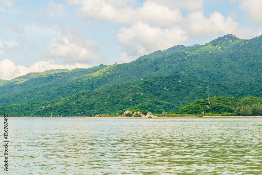 Sea landscape with island shore and clouds - the South China sea - Vietnam, Nha Trang bay