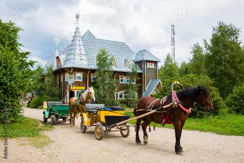 Old carriage in russian tourist center Verhnie Mandrogi photo