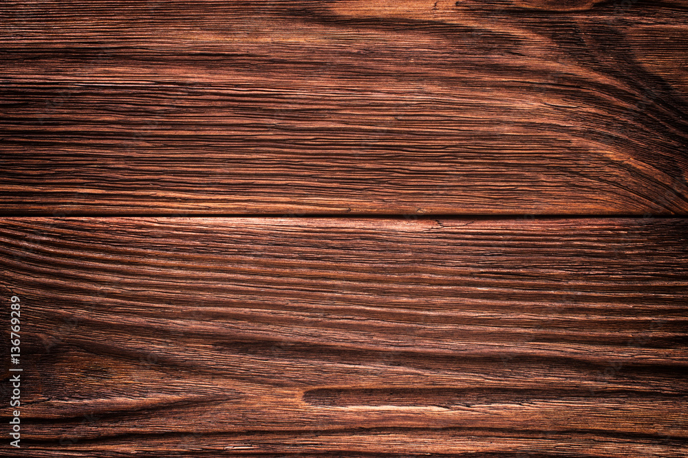 Fototapeta premium vintage aged dark brown wooden background texture