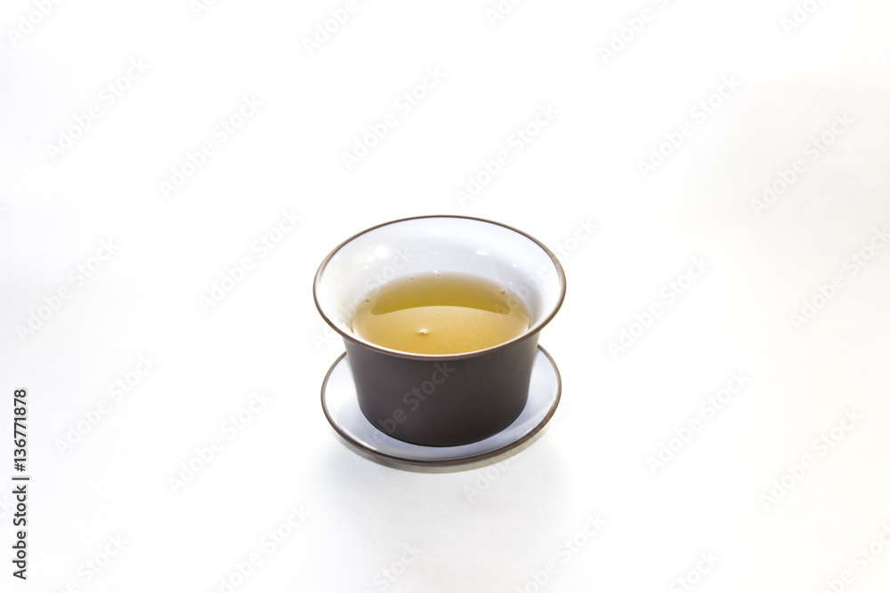 The Chinese tea-things for ceremonies on a white background The Chinese tea-things for ceremonies on a white background