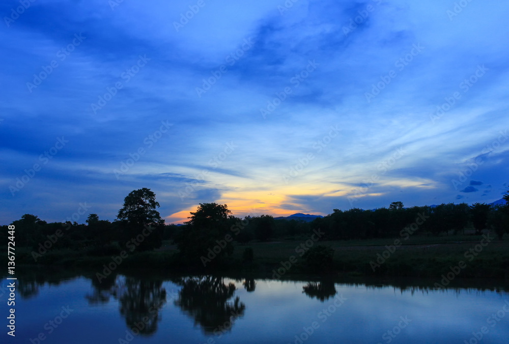 Fototapeta premium sunset colorful and silhouette woodland twilight in nature