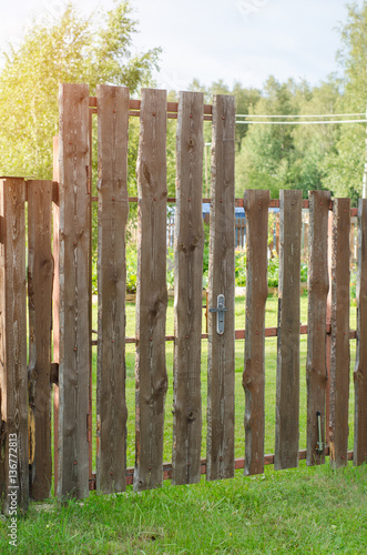 brick and mettal fence photo