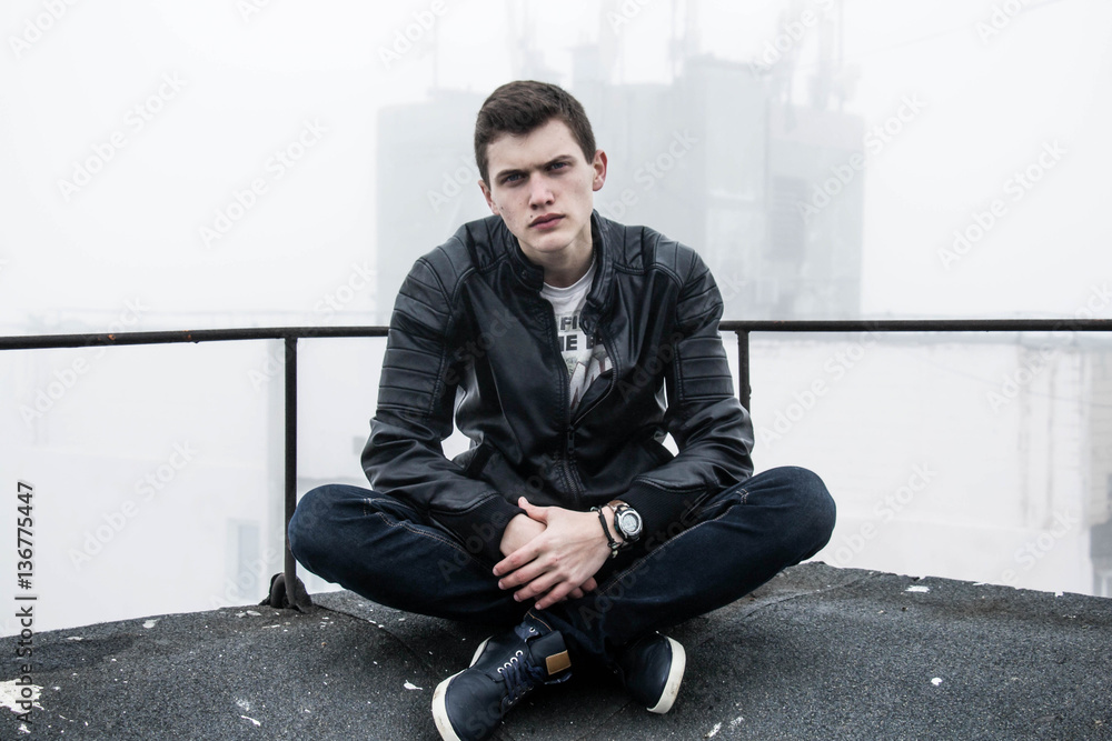 Pensive sad teen sitting black Pensive sad teen sitting black