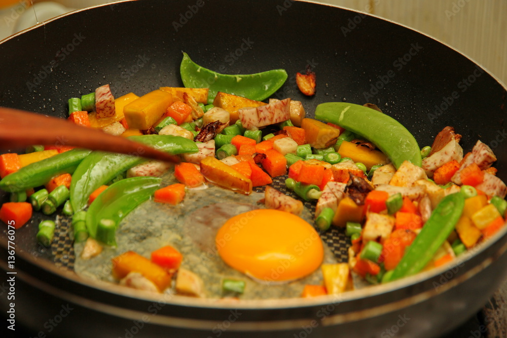 Cooking , Chinese sausage fried rice with mixed vegetable. Cooking , Chinese sausage fried rice with mixed vegetable.