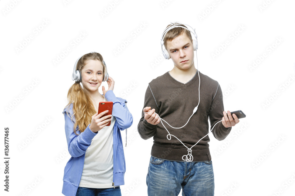 Teen boy and girl with headphones Teen boy and girl with headphones