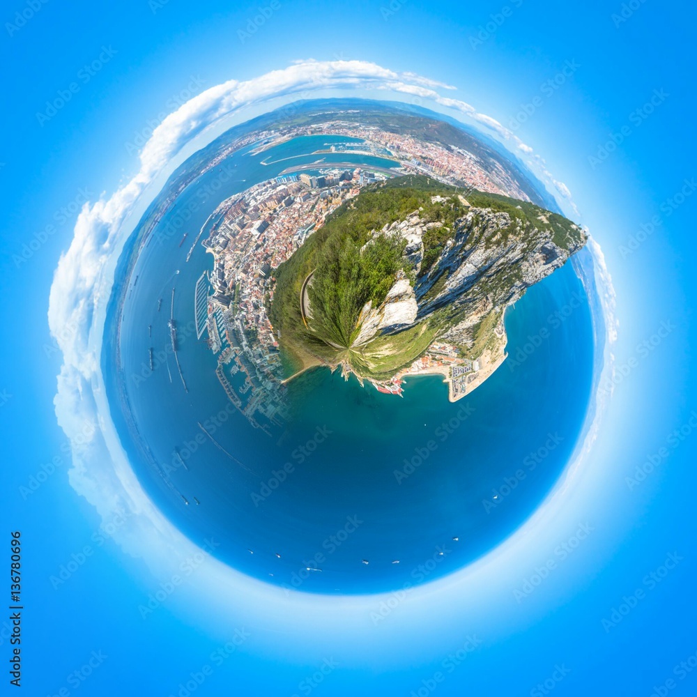 Fototapeta premium Little planet composition of an aerial view of the top of Gibraltar Rock, located in the Upper Rock Natural Reserve. United Kingdom, South West Europe. Globe concept, ecosystem, earth.