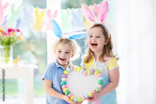 Kids in bunny ears on Easter egg hunt
