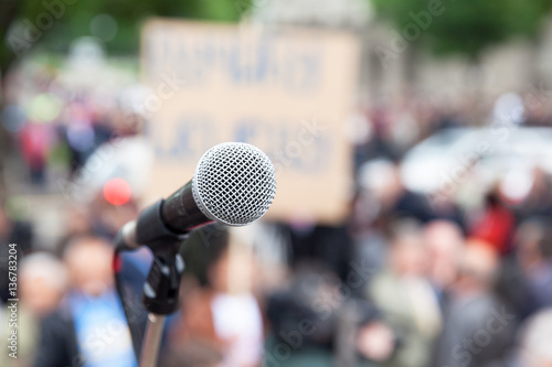 Protest. Public demonstration. Microphone. © wellphoto