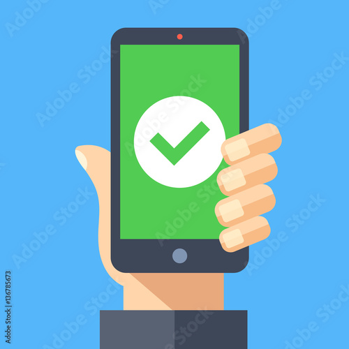 Green check mark icon on smartphone screen. Hand holding smartphone with green tick. Modern flat design graphic elements for web banner, web sites, printed materials, infographics. Vector illustration