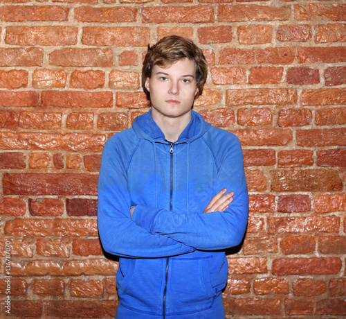 Attractive teenage boy in urban background