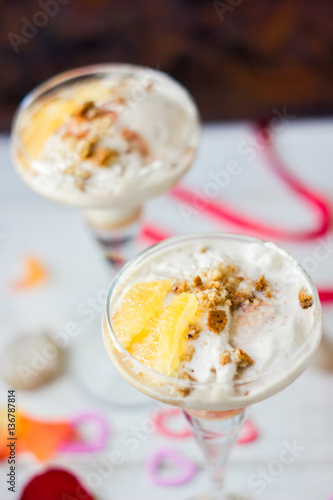 Beautiful dessert for Valentine's day - ice cream with orange.