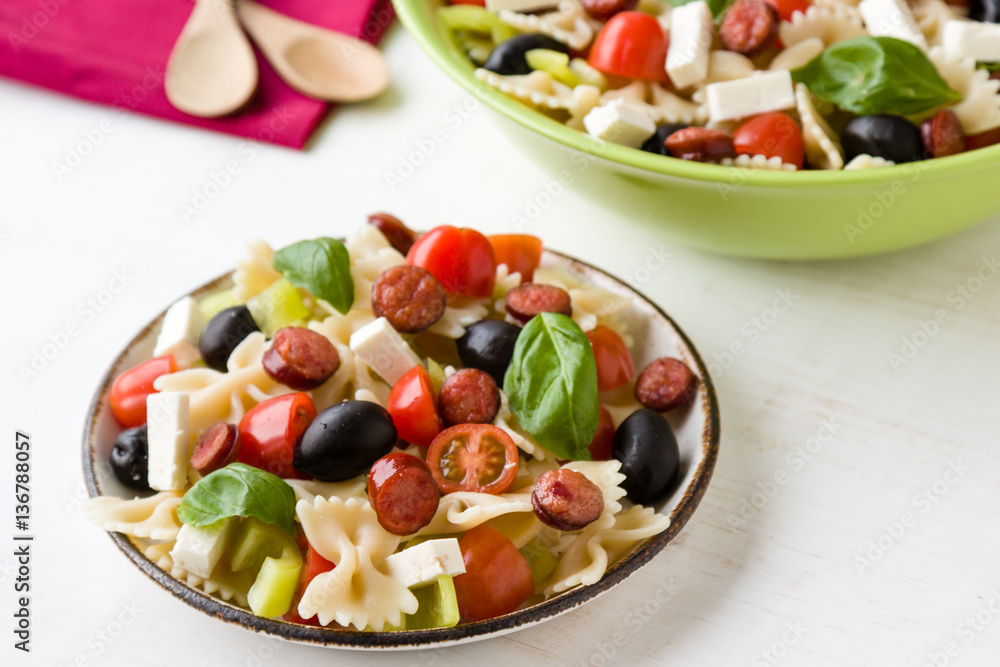 farfalle salad on white table farfalle salad on white table