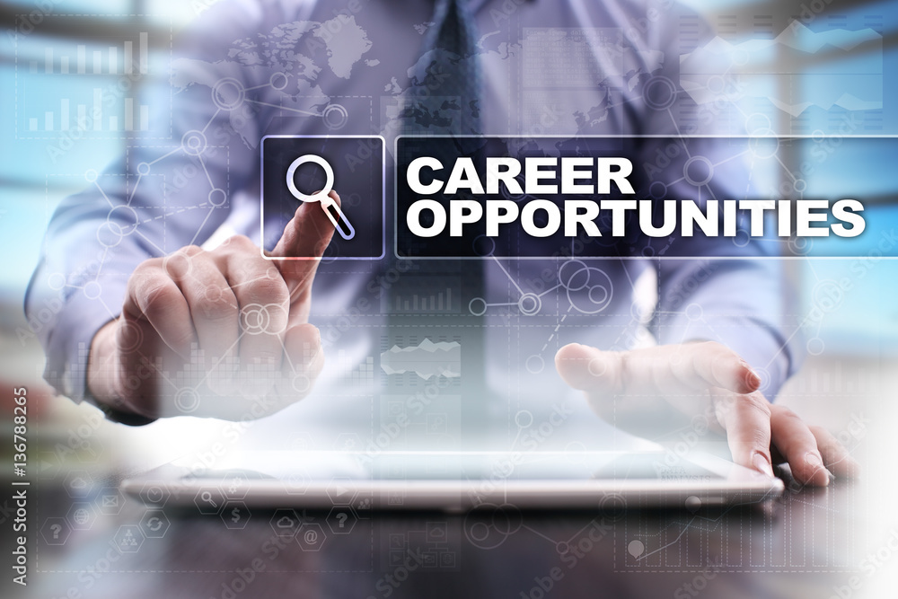 Fototapeta premium Businessman using tablet pc and selecting career opportunities.