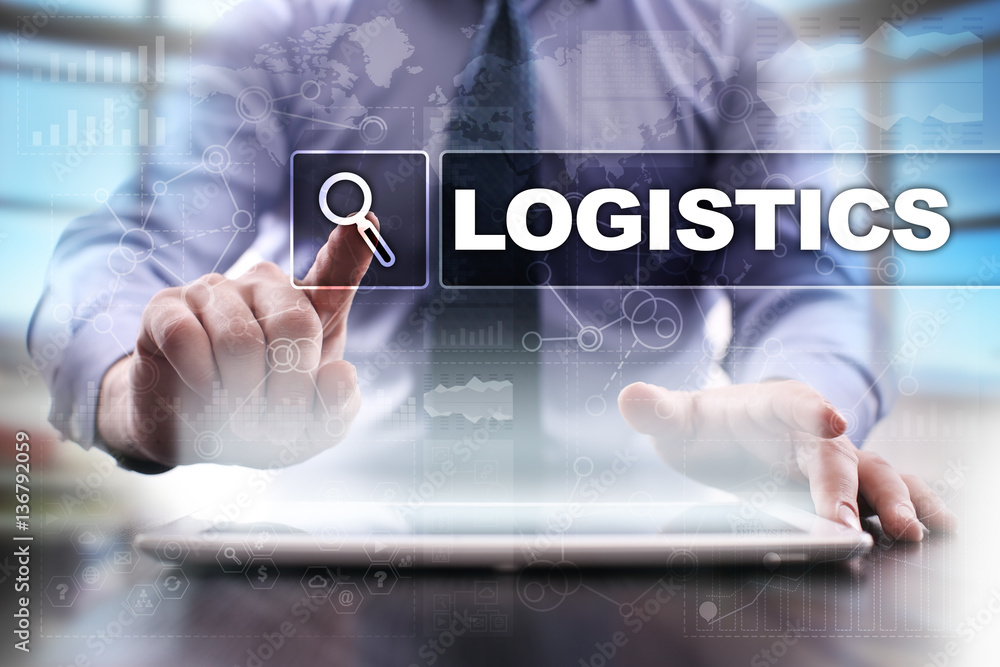 Businessman using tablet pc and selecting logistics.