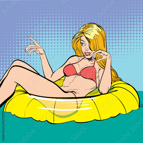 Sexy young lying blonde in a swimming suit. Beautiful young woman. Woman having pleasure. Woman in a dream. Woman in hope. Having pleasure. Concept idea of advertisement. Halftone background.