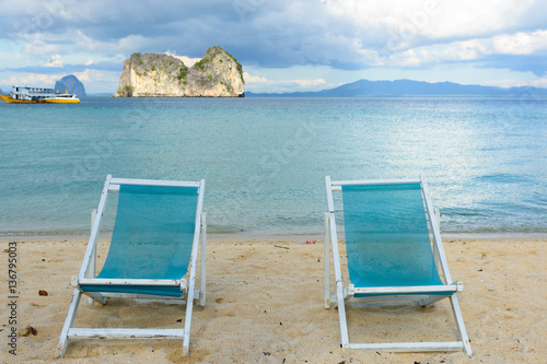 Fototapeta Naklejka Na Ścianę i Meble -  Double chairs near sea
