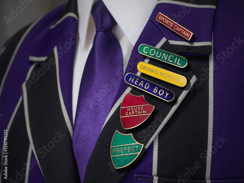 School boys blazer with school numerous badges