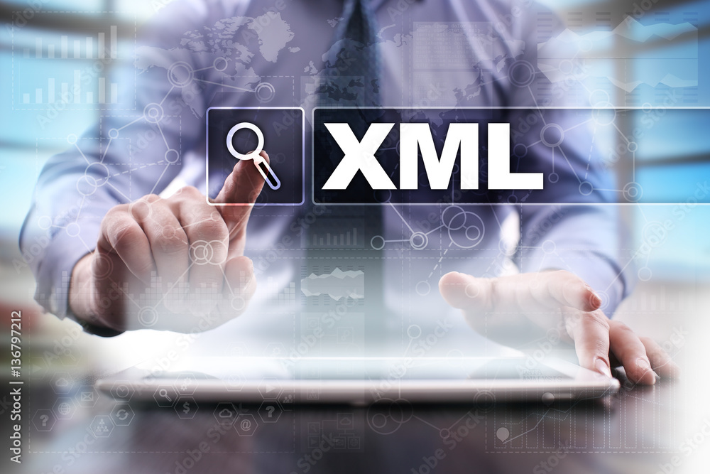 Businessman using tablet pc and selecting xml. Businessman using tablet pc and selecting xml.