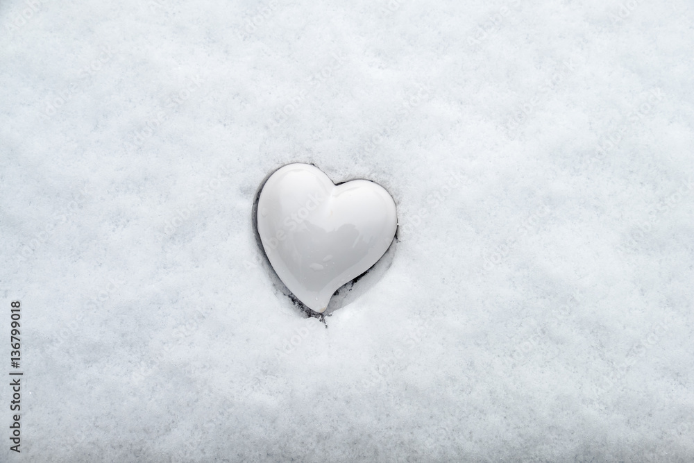 Ceramic heart in the snow Ceramic heart in the snow