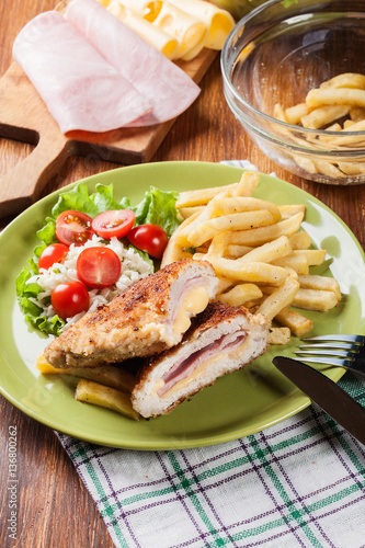 Cutlet Cordon Bleu with pork loin served with French fries and s