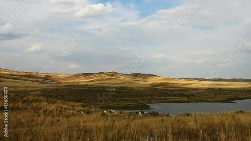 autumnal steppe and lake in Xilingol, China. photo