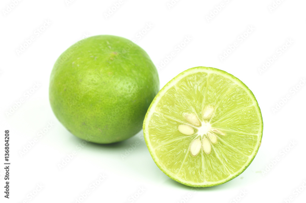 green lemon slice isolated on white background green lemon slice isolated on white background