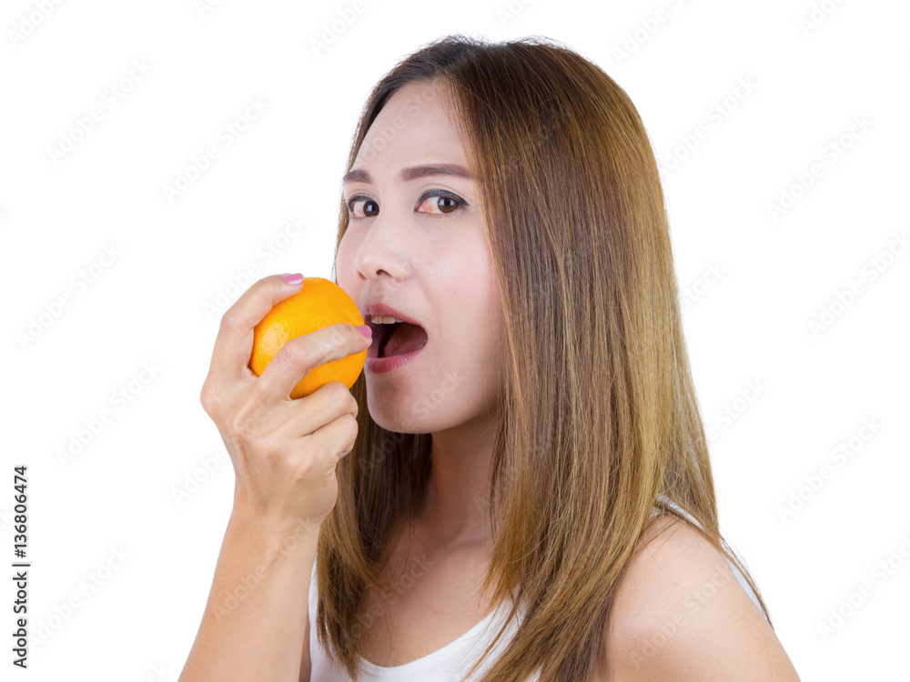 Asian Woman wearing in white shirt And eat orange, isolated on white background. Healthy Food concept. Asian Woman wearing in white shirt And eat orange, isolated on white background. Healthy Food concept.